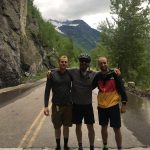 three friends posing on the bike trail