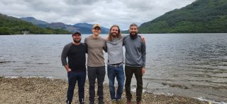 the gang standing on the edge of the largest lake in scotland