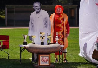 man in hotdog outfit at 100 years of polish